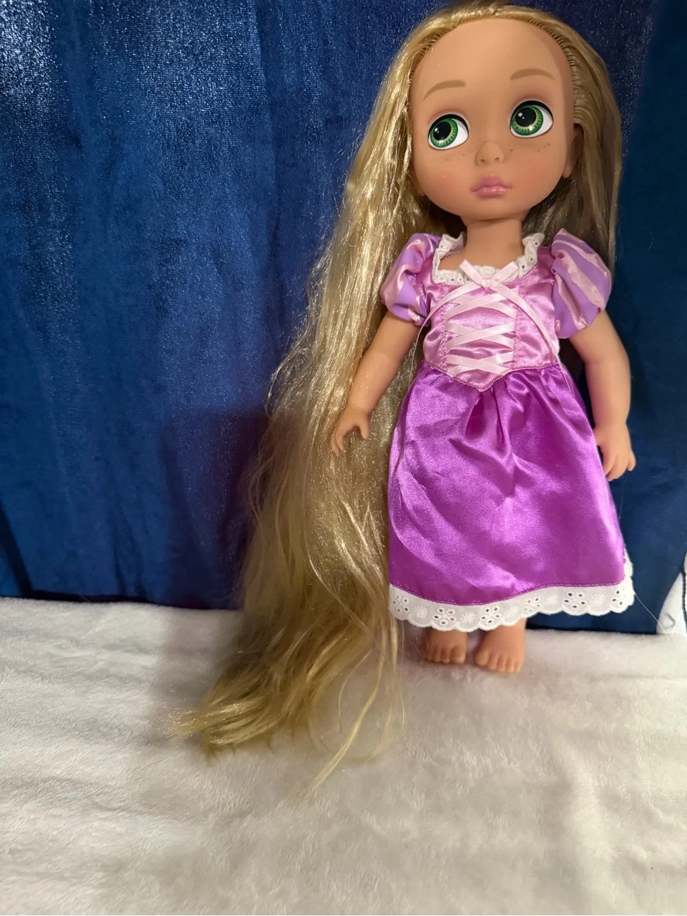 Disney Blonde-Haired Doll in Purple Dress with Green Eyes
